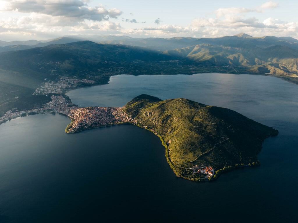 Panoramic aerial view of Kastoria’s peninsula, Lake Orestiada and the surrounding mountains.